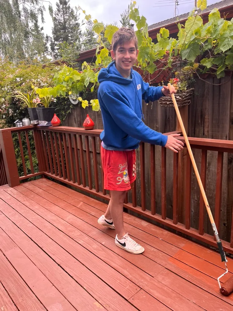 Zac tending the deck and outdoor area