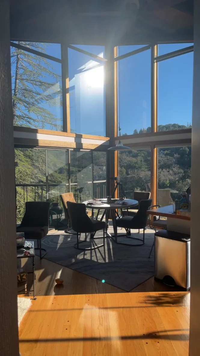A bright dining and living area inside a home