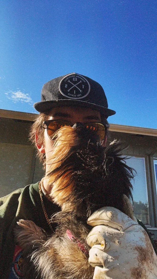 Zac spending time outdoors with a dog in his care