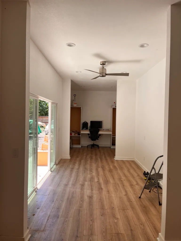 A tidy home office during a house-sitting stay